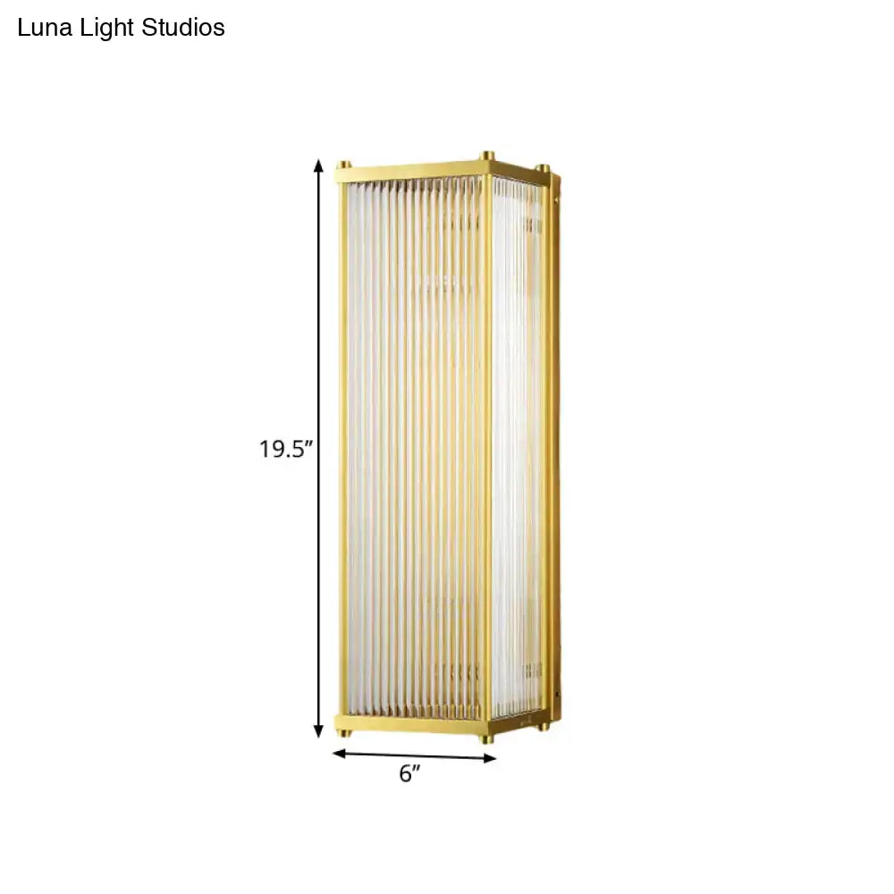 Modern gold wall sconce light with frosted glass panels direct wired electric cuboid design for bedroom use