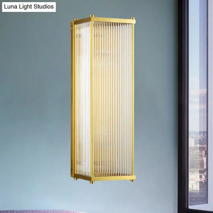 Modern gold crystal cuboid wall sconce light with gold frame and vertical frosted glass panels for direct wired electric use