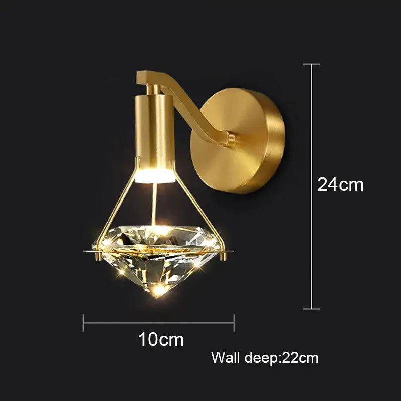 Modern gold crystal diamond wall lamp featuring a gold-finished wall sconce with decorbites crystal diamond pendant
