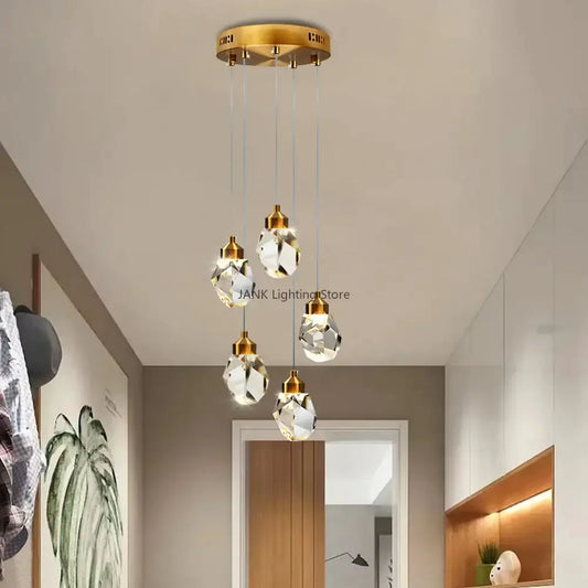 Modern gold crystal dining chandeliers with faceted glass globes and brass fixtures ideal for bedroom and bar room decorbites k9 crystal