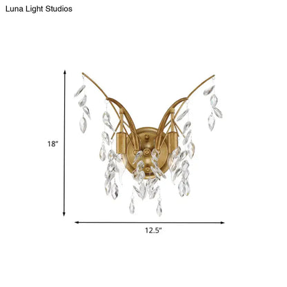 Modern gold crystal drop wall sconce with elegant curved arms and cascading clear crystal droplets for living room lighting