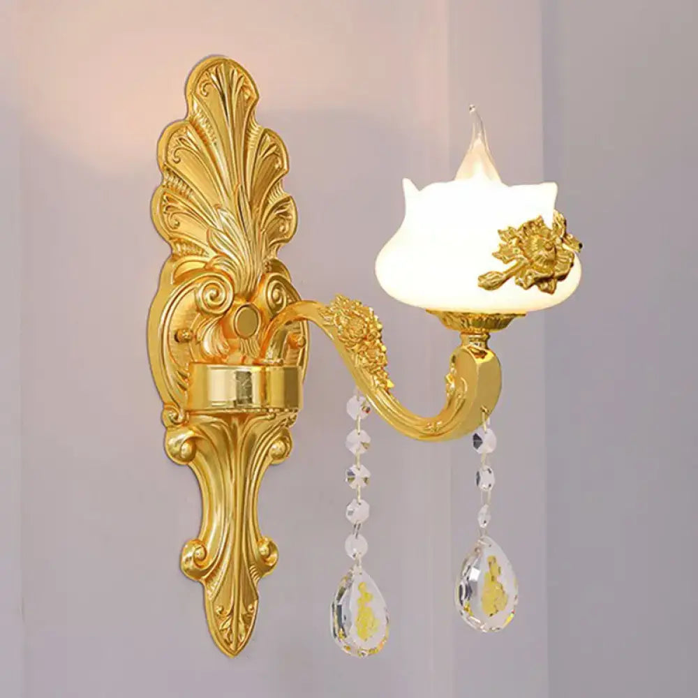 Modern gold crystal droplet wall mount light with white glass shade and dangling crystal pendants for bedroom use