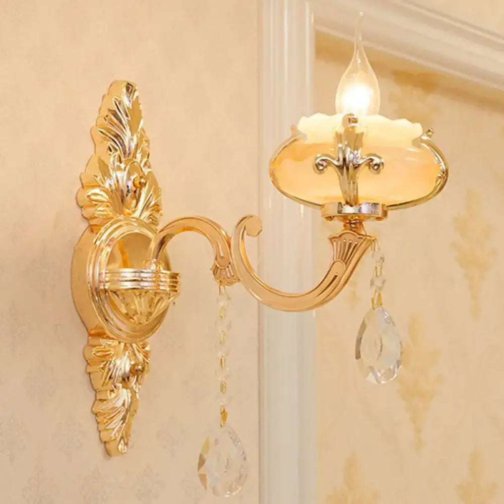 Modern gold crystal droplet wall mount light with ornate gold finish crystal pendants and frosted glass shade for bedroom