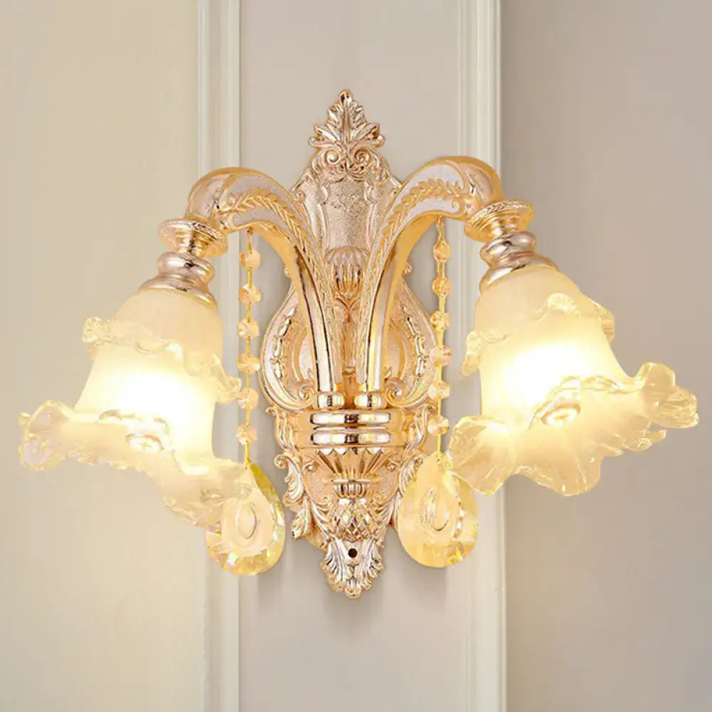 Modern gold crystal droplet wall mount light with ornate design frosted glass shades and decorative crystals for bedroom use