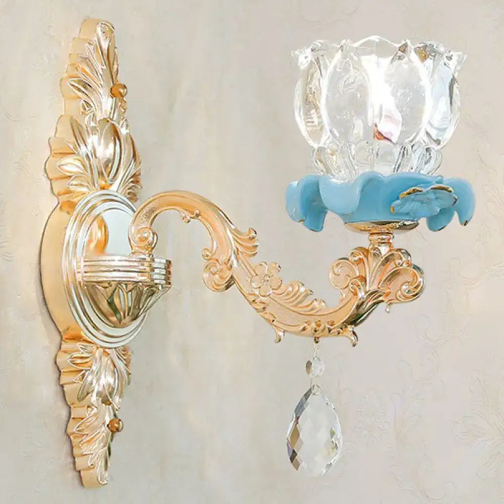 Modern gold wall mount light with crystal lotus lampshade blue ceramic base and faceted crystal droplet for bedroom