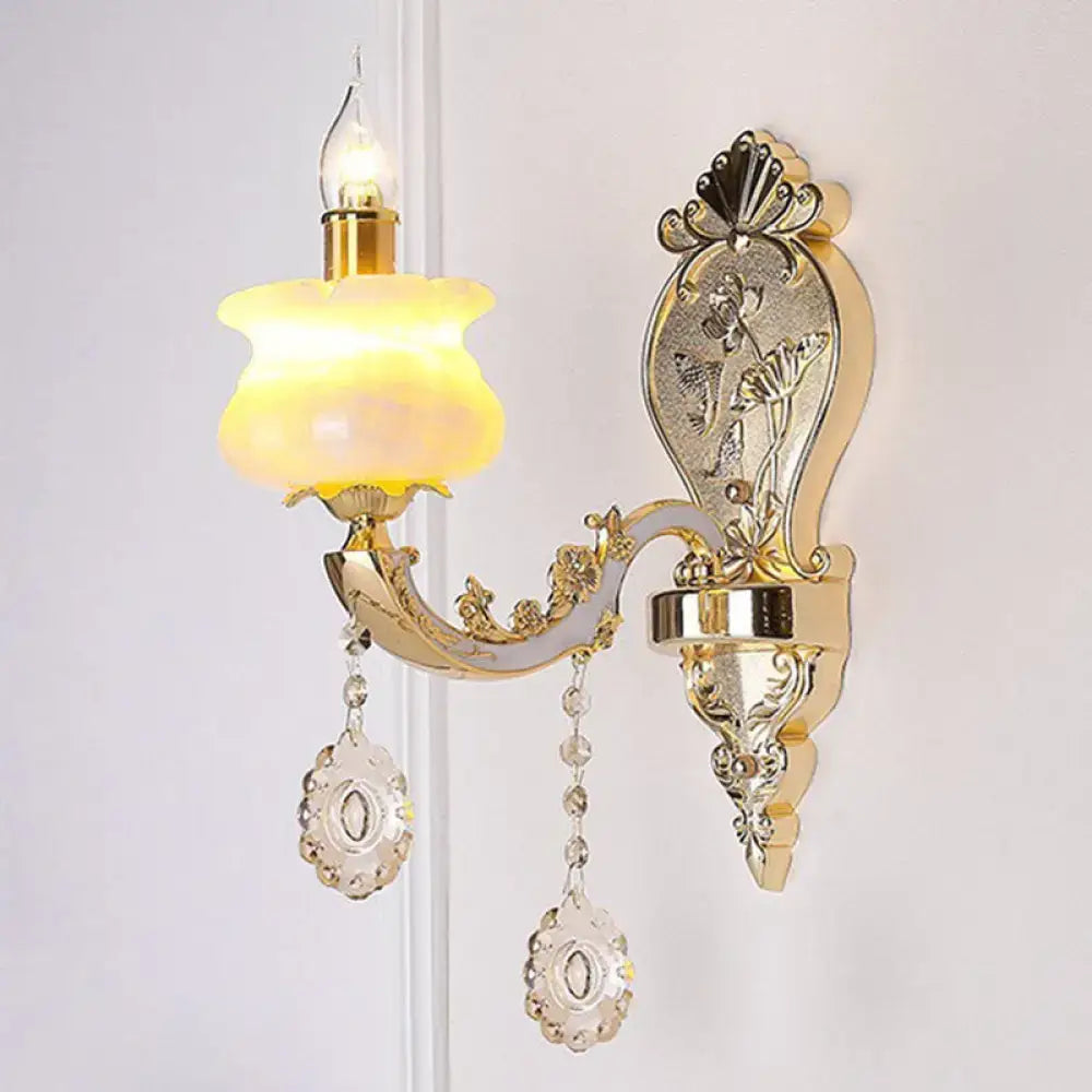 Modern gold crystal droplet wall mount light with frosted yellow glass shade and dangling crystals for bedroom use