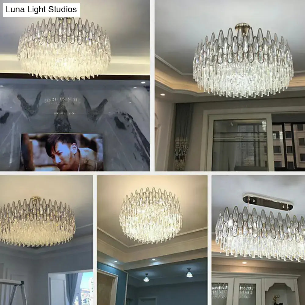 Crystal drum pendant light by decorbites featuring clear glass teardrop elements and metallic fixture for living room