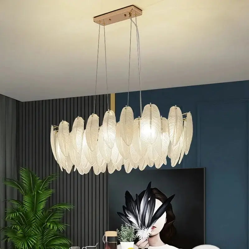 Modern gold crystal feather chandelier pendant light with translucent feather-shaped glass elements by decorbites crystal