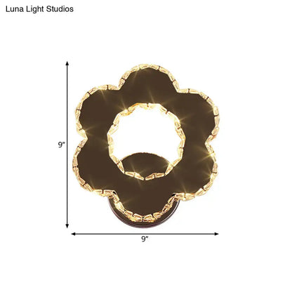 Modern gold crystal flower wall sconce with gold-toned accents, dark brown panel, warm white 220v-240v light fixture