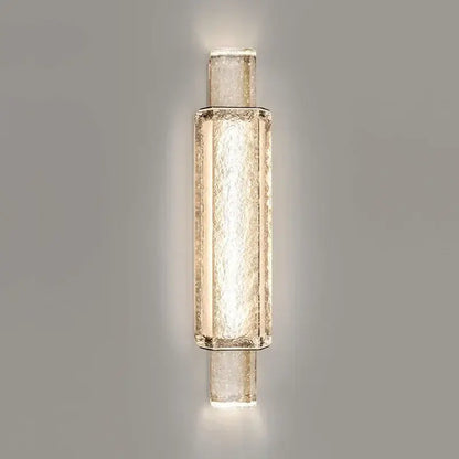 Modern gold crystal glass wall lamps featuring textured translucent glass and metallic frame for elegant wall lights