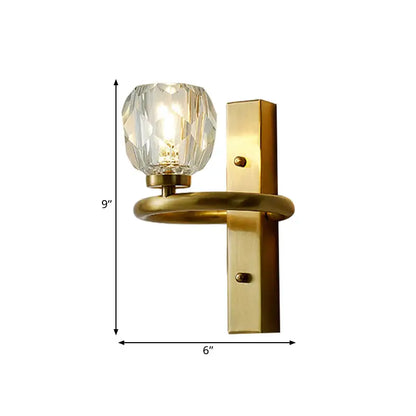 Gold-toned modern crystal globe wall lamp with faceted globe and rectangular backplate for 110v-120v use