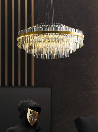 Modern gold crystal hanging lamp with circular metal frame and cascading clear prisms for living room decorbites crystal hanging