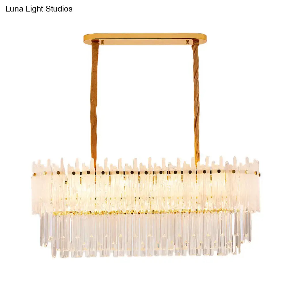 Gold-toned DecorBites™ minimalist 9-light crystal chandelier with cascading clear rods for dining room island lighting