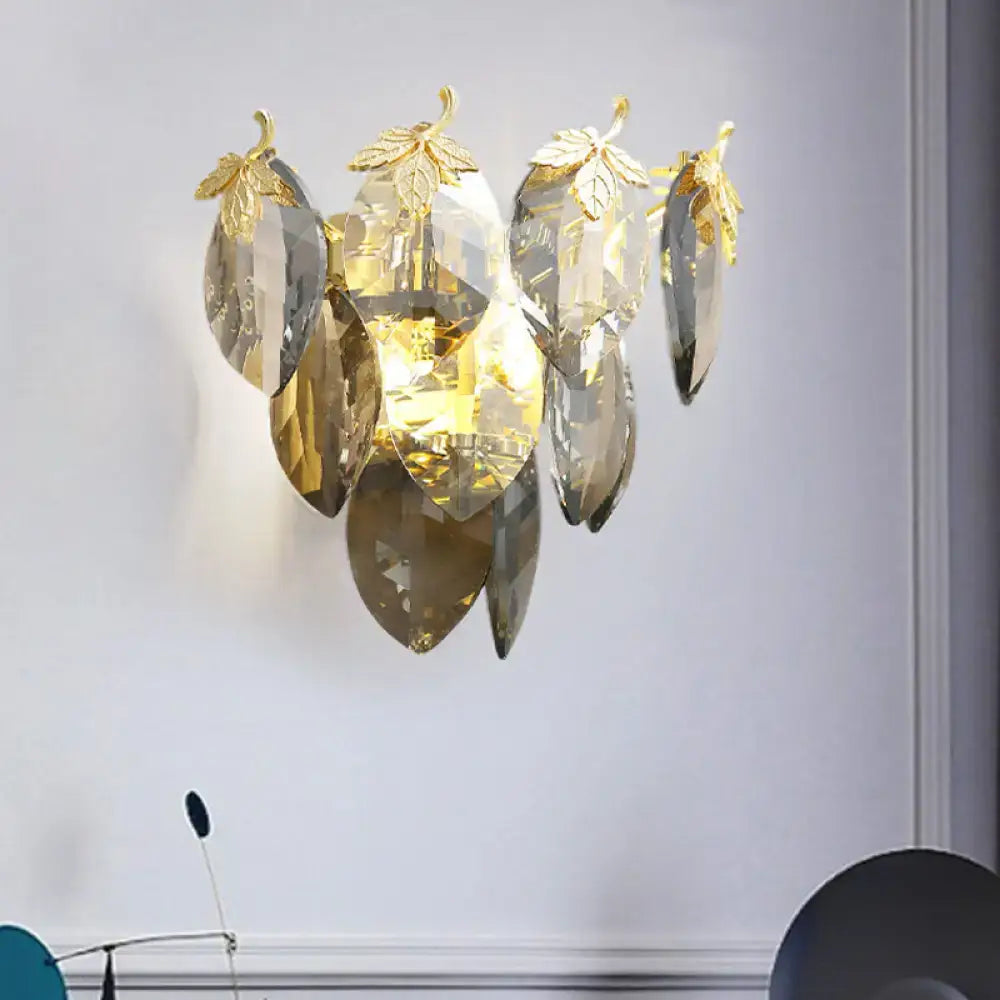 Elegant gold-toned leaf wall lamp with faceted crystal leaves compatible with led incandescent fluorescent bulb base