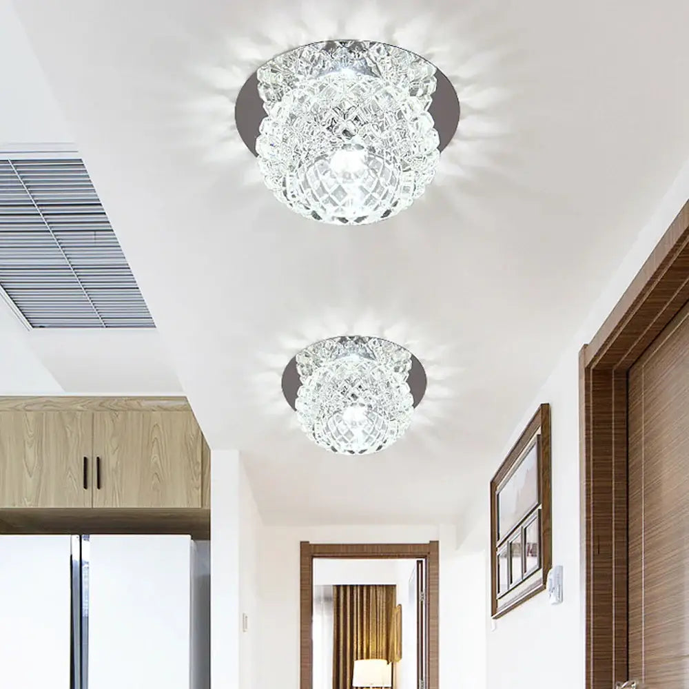 Modern gold decorbites crystal led ceiling chandelier with faceted clear glass and sleek black circular base for corridor lighting
