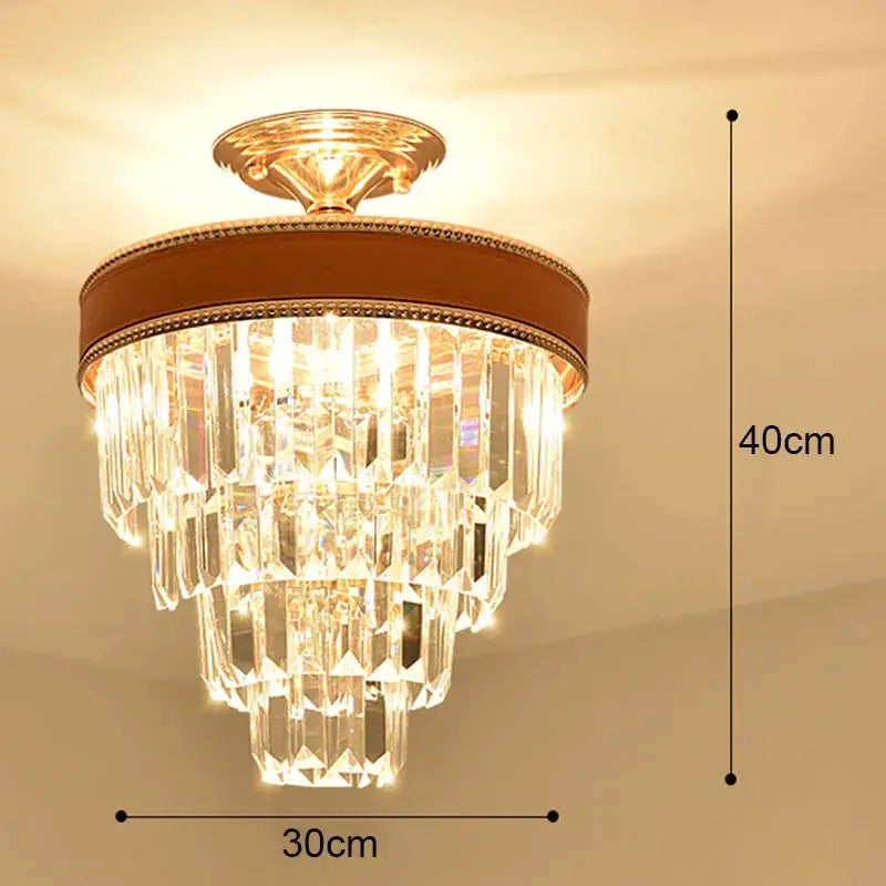 Modern gold crystal led ceiling chandelier with tiered clear prisms and brown leather trim for dining room decorbites crystal led