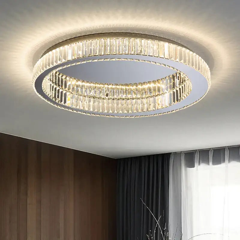 Modern gold crystal led ceiling chandelier with two concentric rings of clear faceted crystals in sleek metallic frame
