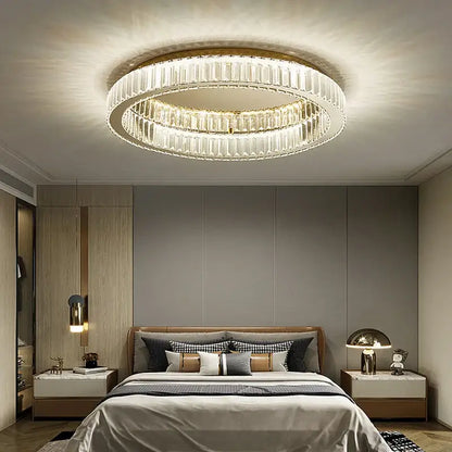 Modern gold crystal led ceiling chandelier featuring two concentric rings of faceted crystals in a metal frame
