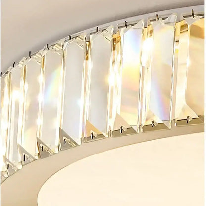 Modern gold crystal led ceiling light with curved chrome frame and clear faceted panels by decorbites crystal led