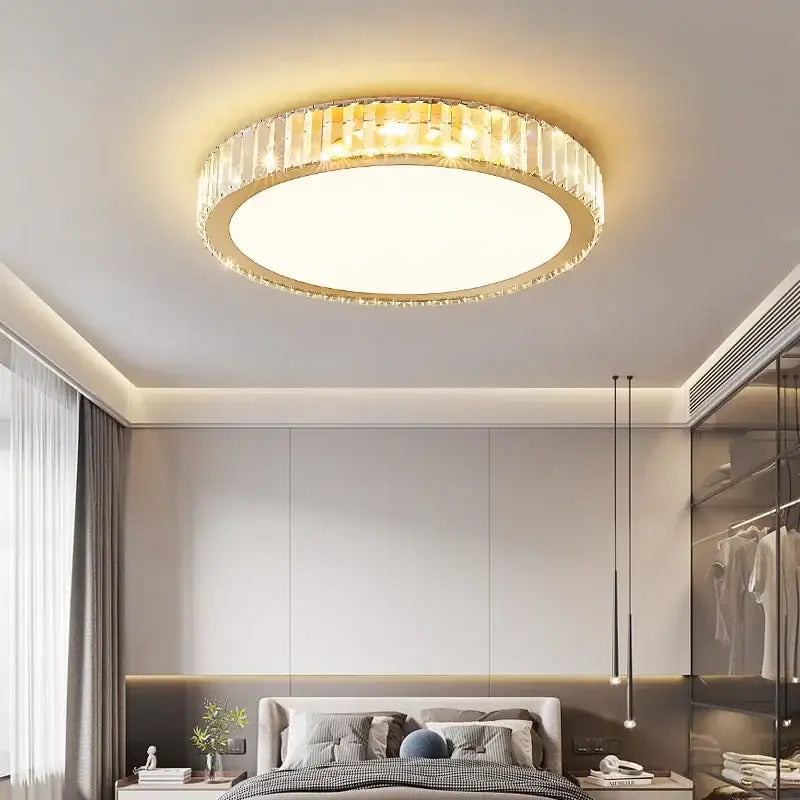 Modern gold crystal led ceiling light with faceted crystal ring and illuminated center for bedroom decorbites crystal led
