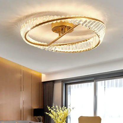 Modern gold crystal led chandelier ceiling light featuring two concentric rings of faceted crystal accents for living room decorbites crystal led