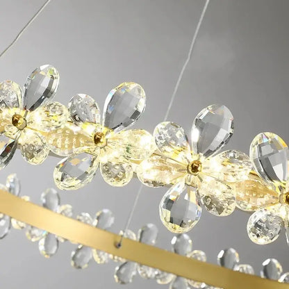 Modern gold crystal led chandelier with faceted crystal flowers and warm led lights for dining room decorbites lighting
