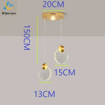 Modern gold crystal led chandelier featuring two textured clear glass orbs suspended by thin cords by decorbites crystal led