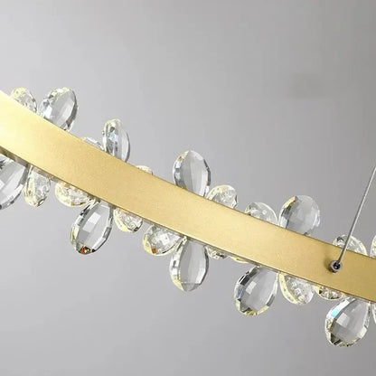 Modern gold crystal led chandelier with gold-toned linear bar and clear faceted crystal droplets for dining room decorbites crystal led
