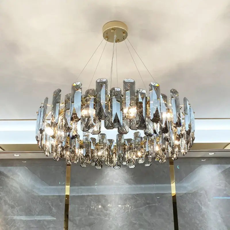 Modern gold crystal led chandelier with faceted clear crystals and gold-toned mount for living room decorbites crystal led