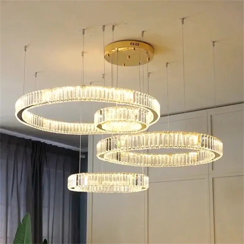 Modern gold crystal led chandelier rings featuring concentric clear crystal prisms for villa staircase decorbites crystal led