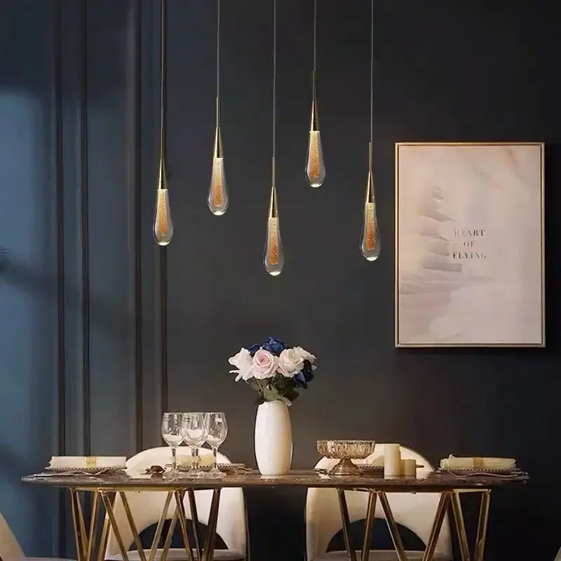 Five elegant teardrop decorbites crystal led pendant lights with gold tops and glitter glass for dining room decorbites crystal led chandelier