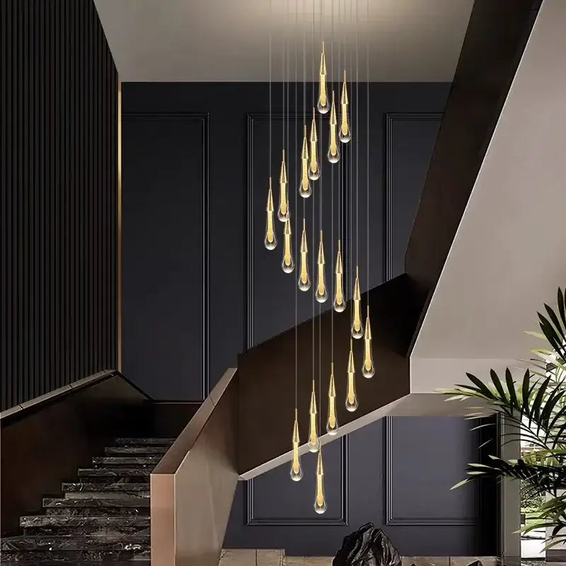 Modern gold crystal led chandelier featuring teardrop pendant lights for elegant dining room decorbites pendant light
