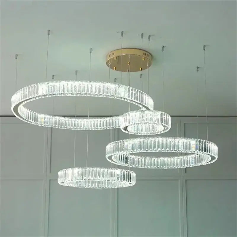 Modern gold crystal led ring chandelier with tiered concentric crystal rings for stairwell pendant decorbites crystal led