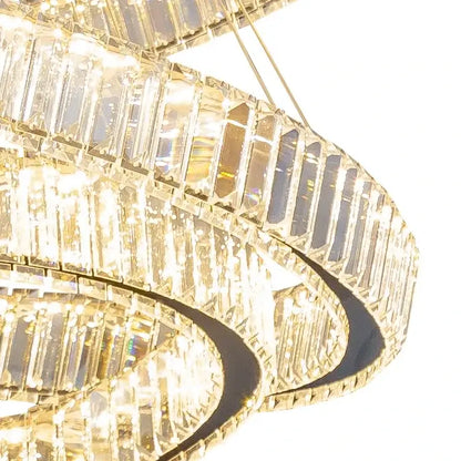 Modern gold crystal led ring chandelier with cascading faceted prisms in a sleek frame for stairwell decorbites crystal led