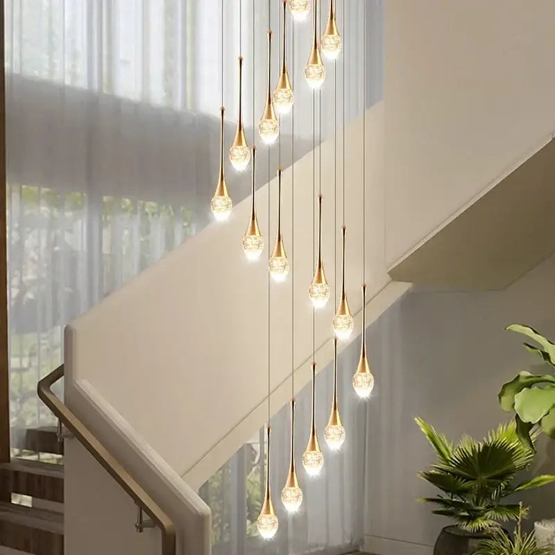 Modern gold crystal led staircase chandelier with teardrop glass shades for elegant decorbites crystal led lighting
