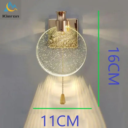 Modern gold crystal led wall lamp with clear glass globe shade filled with glitter and wooden pull chain decorbites crystal led