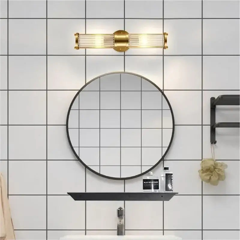 Modern gold crystal led wall lamp with clear glass rods and central brass accent for elegant decorbites crystal led sconce