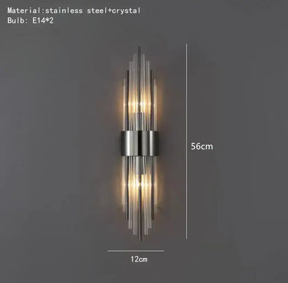 Modern gold crystal led wall lamp featuring sleek vertical stainless steel rods with crystal accents for bedroom decorbites crystal led
