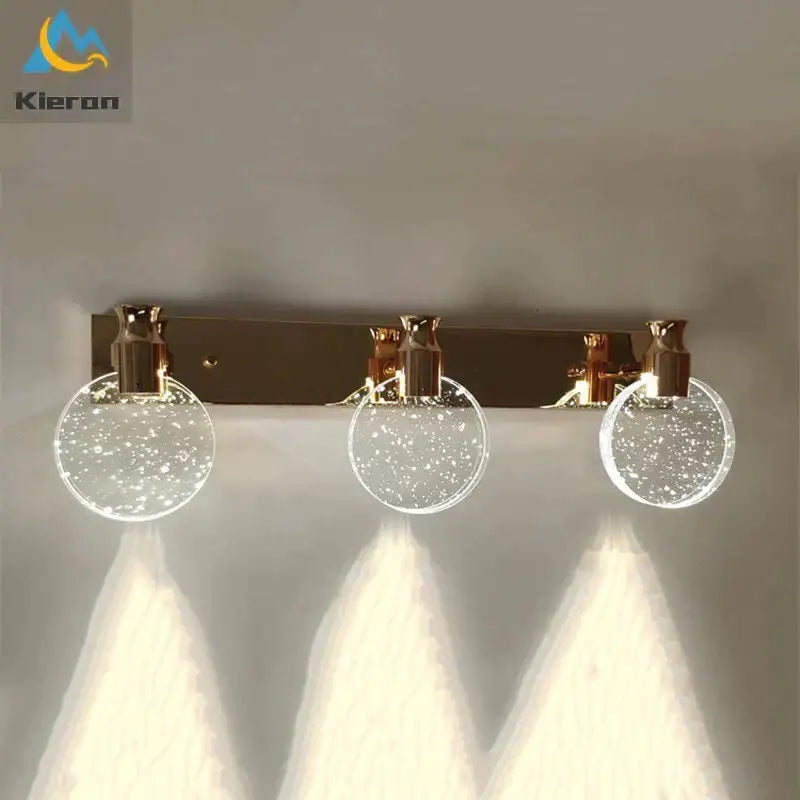 Modern gold crystal led wall lamp with three clear glass globe shades for bathroom use with simple crystal led design