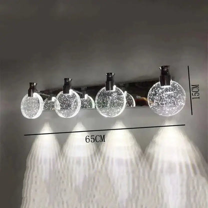 Modern gold crystal led wall lamp with three simple crystal led globes and sleek chrome accents for bathroom use