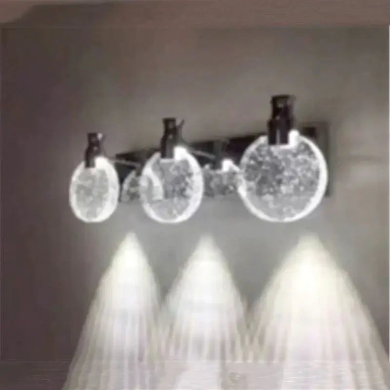 Modern gold crystal led wall lamp with simple crystal led three globe light and black metal arms for bathroom use