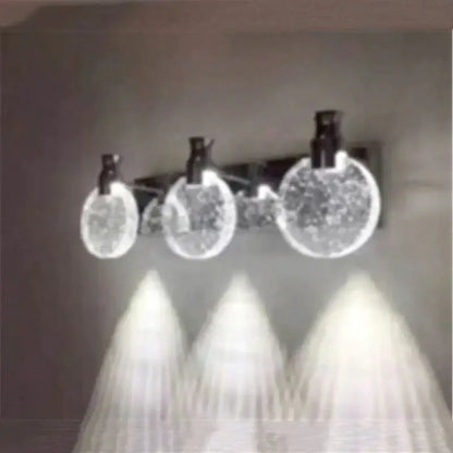 Modern gold crystal led wall lamp with simple crystal led three globe light and black metal arms for bathroom use