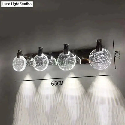 Modern gold crystal led wall lamp with simple crystal led globes and sleek chrome accents for bathroom lighting
