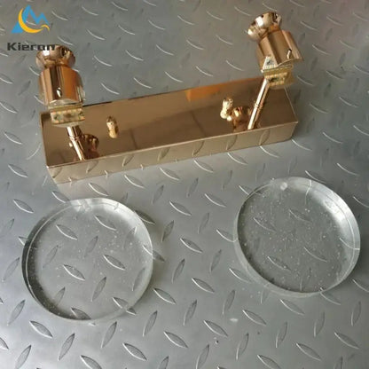 Gold-colored metal fire extinguisher nozzle assembly with two cylindrical nozzles for modern crystal led wall lamp