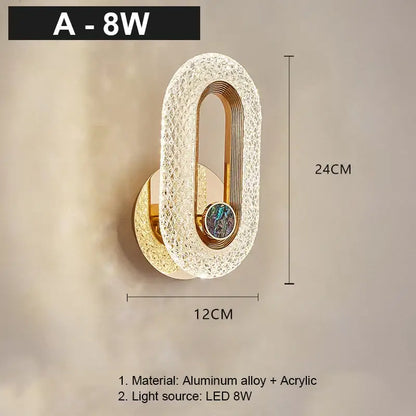 Modern gold led wall lamp with textured acrylic body and iridescent stone accent for living room sconce lighting