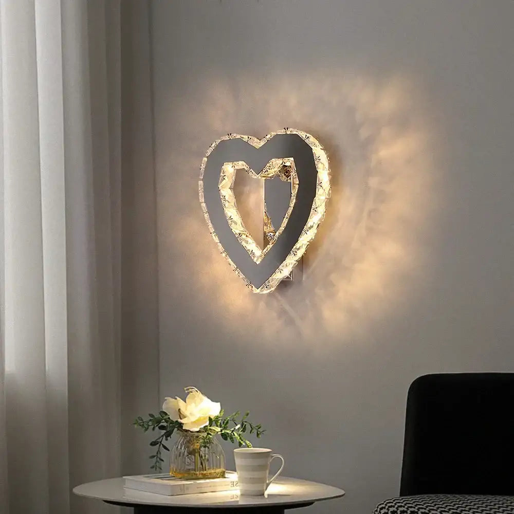 Modern gold crystal led heart-shaped wall light with a glowing crystal-encrusted frame for decorbites crystal led sconce