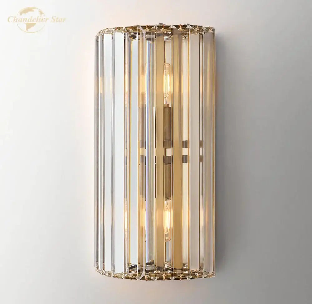Modern gold crystal led wall sconce with vertical crystal rods and filament bulbs for bedroom lighting decorbites crystal led