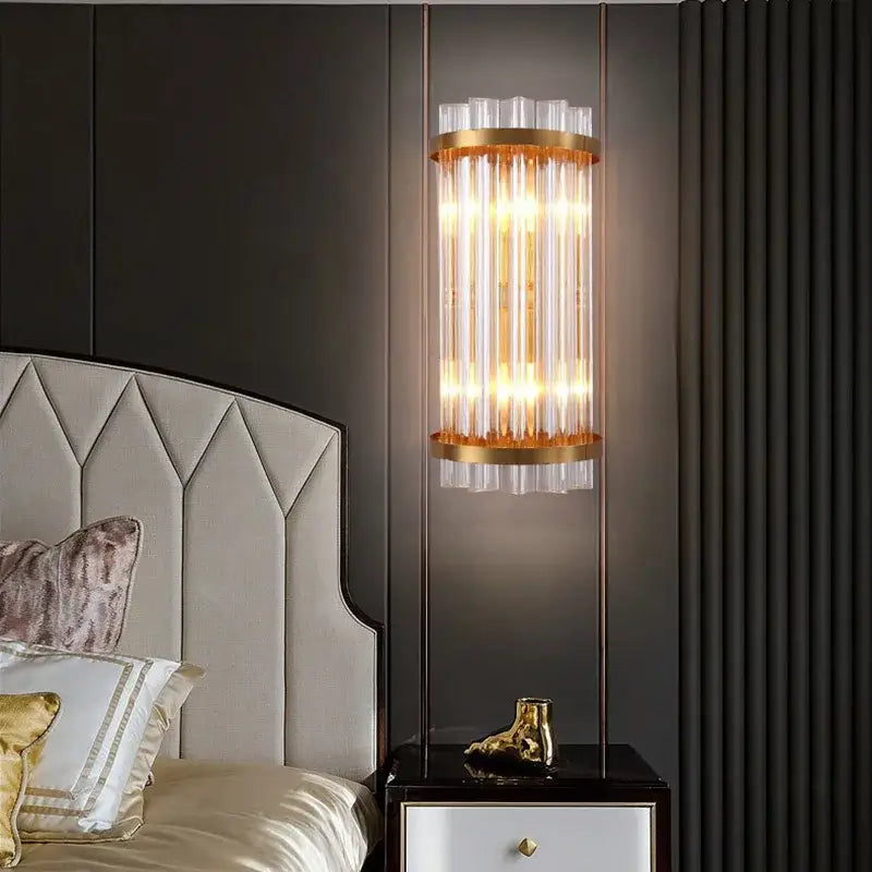 Modern gold crystal luxury wall lamp featuring cylindrical gold-toned metal frames and vertical clear glass rods decorbites crystal luxury wall lamp