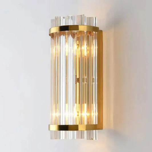 Elegant modern gold wall lamp with vertical crystal rods showcasing decorbites crystal luxury for bedroom sconce decor