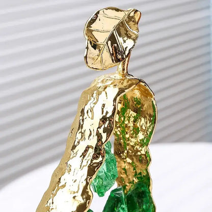 Modern gold crystal metal fruit sculpture set featuring a textured leaf figurine with green glass accents for decorbites decor